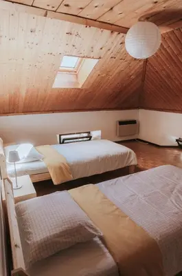 Ein Bett oder Betten in einem Zimmer der Unterkunft The Nucleo House Experience