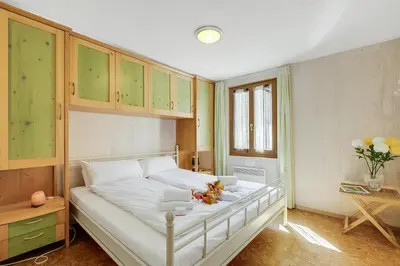 Ein Bett oder Betten in einem Zimmer der Unterkunft Casa Andy 1 Val Lavizzara - Happy Rentals