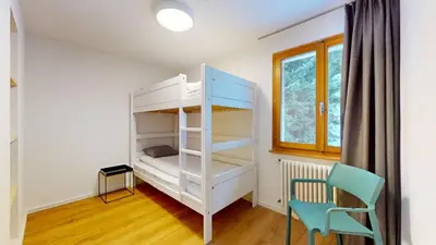 Ein Bett oder Betten in einem Zimmer der Unterkunft Chalet de lOurs AUTHENTIC Etage Penthes 14 pers