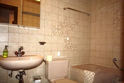 Ein Badezimmer in der Unterkunft Mandarin A11