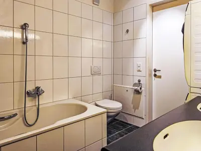 Ein Badezimmer in der Unterkunft Apartment Eiger by Interhome
