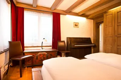 Ein Bett oder Betten in einem Zimmer der Unterkunft Bernerhof Residence