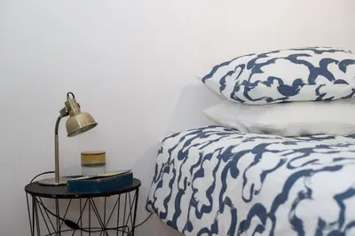 Ein Bett oder Betten in einem Zimmer der Unterkunft Riverside Apartment