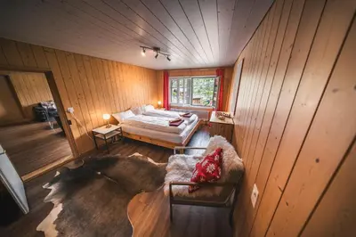 Ein Bett oder Betten in einem Zimmer der Unterkunft EIGERMAGIC Chalet Wartstein