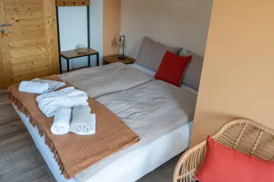 Ein Bett oder Betten in einem Zimmer der Unterkunft BnB Feuille de Vigne