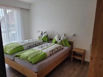 Ein Bett oder Betten in einem Zimmer der Unterkunft Haus Perle