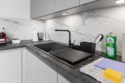 Küche/Küchenzeile in der Unterkunft Bel appartement rénové avec vue, à Savièse