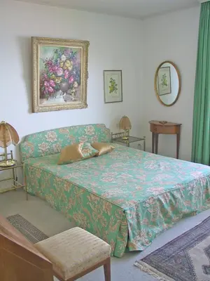 Ein Bett oder Betten in einem Zimmer der Unterkunft Casa Martina, 4,5-Zimmerhaus by HolAp SA