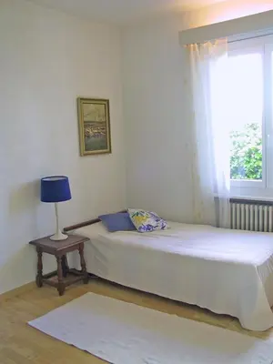 Ein Bett oder Betten in einem Zimmer der Unterkunft Casa Martina, 4,5-Zimmerhaus by HolAp SA