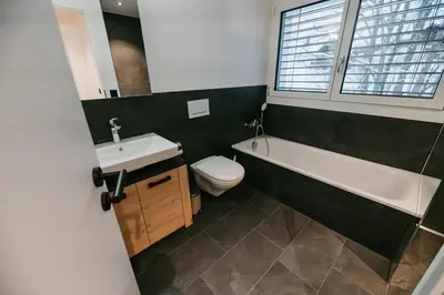 Ein Badezimmer in der Unterkunft Abendrot- grosse moderne und stilvolle Ferienwohnung im Bergdorf Sörenberg