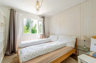 Ein Bett oder Betten in einem Zimmer der Unterkunft Balcony and Terrace with View and 15min to Interlaken