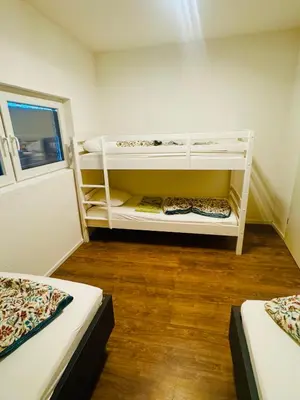 Ein Bett oder Betten in einem Zimmer der Unterkunft Villa Lakeview Appartment