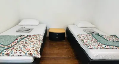 Ein Bett oder Betten in einem Zimmer der Unterkunft Villa Lakeview Appartment