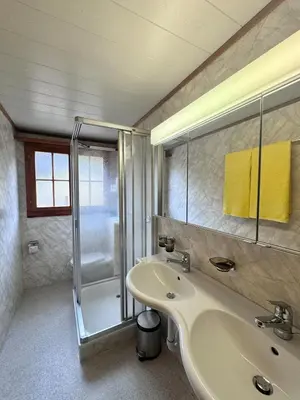 Ein Badezimmer in der Unterkunft Chalet Gemsblick