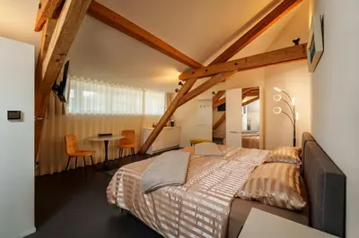 Ein Bett oder Betten in einem Zimmer der Unterkunft Le Relais du Simplon