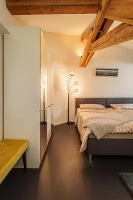 Ein Bett oder Betten in einem Zimmer der Unterkunft Le Relais du Simplon