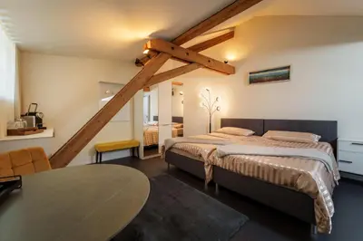 Ein Bett oder Betten in einem Zimmer der Unterkunft Le Relais du Simplon