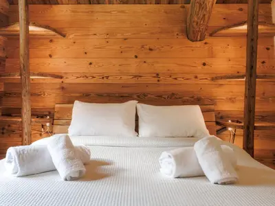Ein Bett oder Betten in einem Zimmer der Unterkunft Chalet Chalet Gaea by Interhome