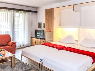Ein Bett oder Betten in einem Zimmer der Unterkunft Apartment Pasadena-5 by Interhome