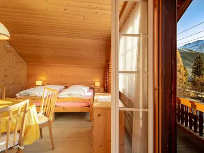 Ein Bett oder Betten in einem Zimmer der Unterkunft Apartment Berna 2- Stock by Interhome