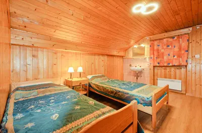 Ein Bett oder Betten in einem Zimmer der Unterkunft Chalet Les Bardeaux