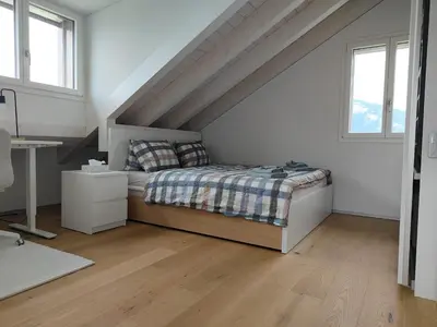 Ein Bett oder Betten in einem Zimmer der Unterkunft Entire house 20 min from Interlaken