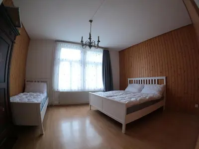 Ein Bett oder Betten in einem Zimmer der Unterkunft Harderblick