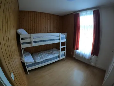 Ein Bett oder Betten in einem Zimmer der Unterkunft Harderblick