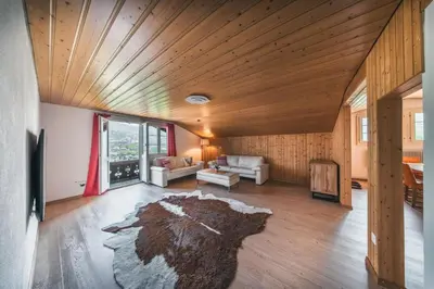 Ein Bett oder Betten in einem Zimmer der Unterkunft ALPINEMAGIC Chalet Wartstein