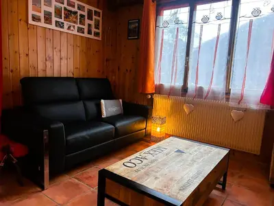 Ein Sitzbereich in der Unterkunft Beau Sejour 2 - Appartement 6 personnes - Evolene