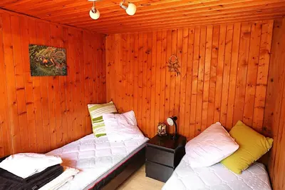 Ein Bett oder Betten in einem Zimmer der Unterkunft Le Tsenevire - appartement 4 personnes - Evolene