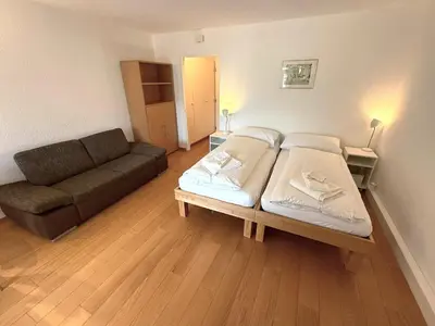 Ein Bett oder Betten in einem Zimmer der Unterkunft Fortuna 113