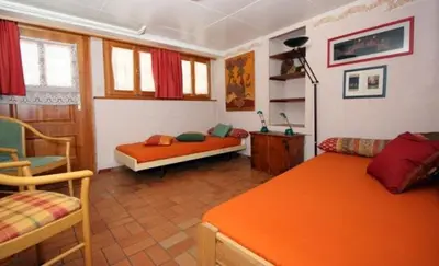 Ein Bett oder Betten in einem Zimmer der Unterkunft Heimatkunst 1 Lucia