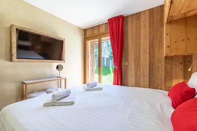Ein Bett oder Betten in einem Zimmer der Unterkunft Polaris 1 004 LUXE & SKI LIFT apartment 6 pers