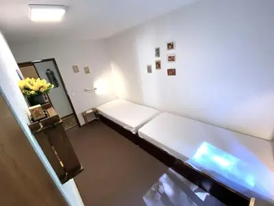 Ein Bett oder Betten in einem Zimmer der Unterkunft Lärchenwald 1803
