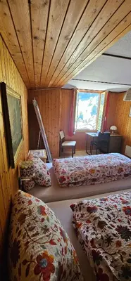 Ein Bett oder Betten in einem Zimmer der Unterkunft The Saxeten at alps