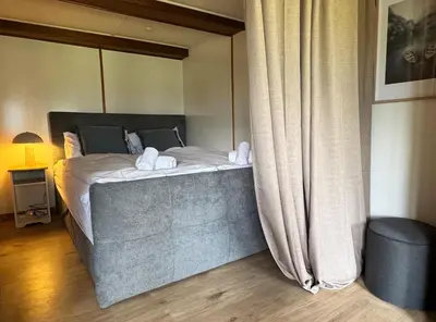 Ein Bett oder Betten in einem Zimmer der Unterkunft River 1 - Retreat with Iconic Jungfraujoch View