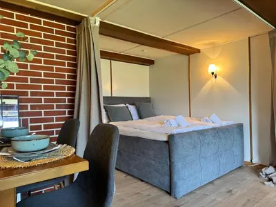 Ein Bett oder Betten in einem Zimmer der Unterkunft River 1 - Retreat with Iconic Jungfraujoch View