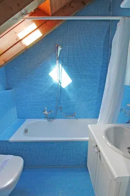 Ein Badezimmer in der Unterkunft Rustico Camelia by HolAp SA