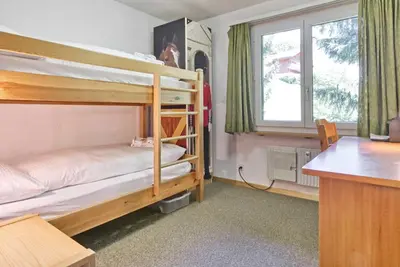 Ein Bett oder Betten in einem Zimmer der Unterkunft Apartment Bodmisunne 4,5 - GRIWA RENT AG