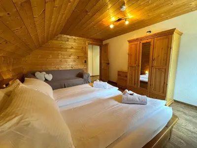 Ein Bett oder Betten in einem Zimmer der Unterkunft Chalet Im Bätzenboden