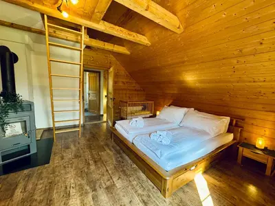 Ein Bett oder Betten in einem Zimmer der Unterkunft Chalet Im Bätzenboden