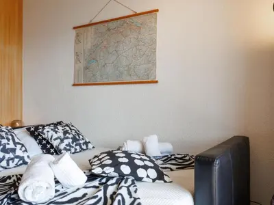 Ein Bett oder Betten in einem Zimmer der Unterkunft Studio Beau Soleil G11 by Interhome