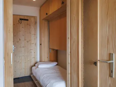 Ein Bett oder Betten in einem Zimmer der Unterkunft Studio Beau Soleil G11 by Interhome