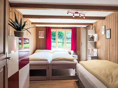 Ein Bett oder Betten in einem Zimmer der Unterkunft Apartment Galliweidli by Interhome