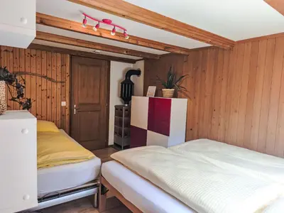 Ein Bett oder Betten in einem Zimmer der Unterkunft Apartment Galliweidli by Interhome