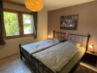 Ein Bett oder Betten in einem Zimmer der Unterkunft Apartment Thermik 3 1- OG Süd by Interhome