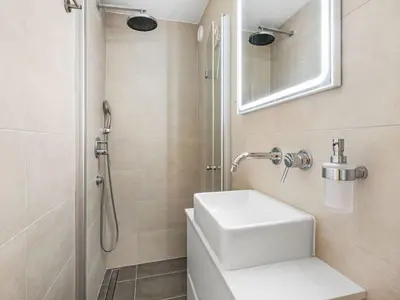 Ein Badezimmer in der Unterkunft Apartment Reseda 3-23 by Interhome