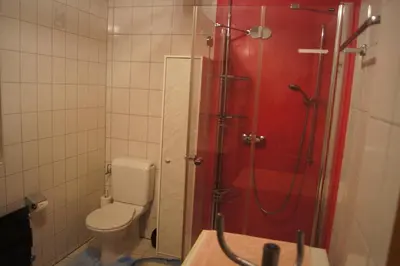 Ein Badezimmer in der Unterkunft Fluehüsli
