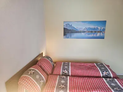 Ein Bett oder Betten in einem Zimmer der Unterkunft Lake Lodge